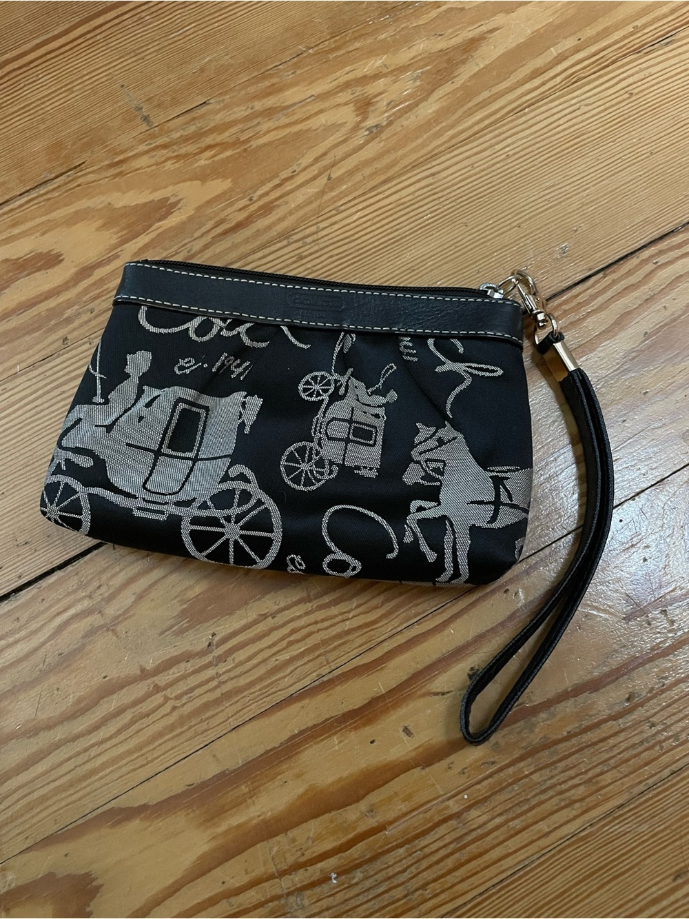 Coach Black Wristlet with Silver Carriage Print